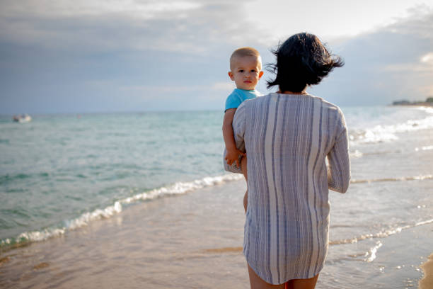 istock Mother and son on a beach 1014489392