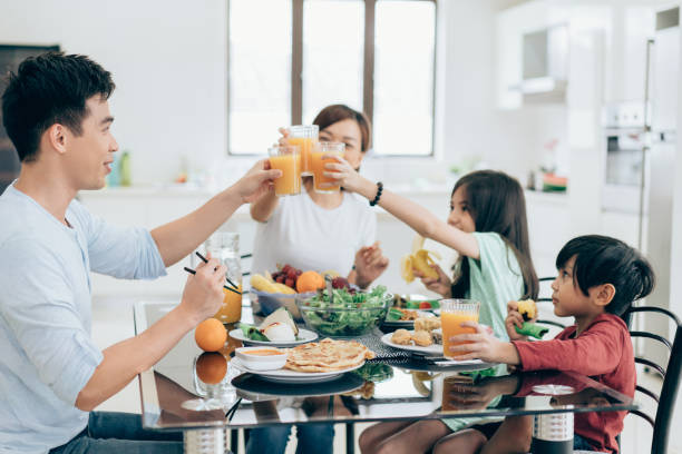 istock Happy Asian ethnicity family at the table 1014494086