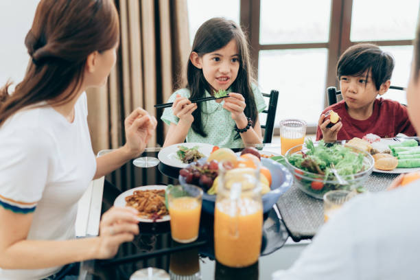 istock Happy family having a breakfast together 1014494092