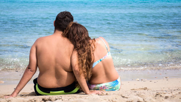 istock Young Couple On Beach 1014499380