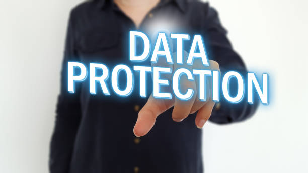 istock Businesswoman pointing finger on data protection text 1014509092