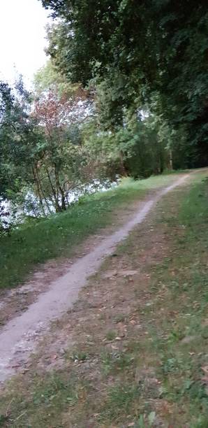 istock pathway on the bank of Cher river 1014516428