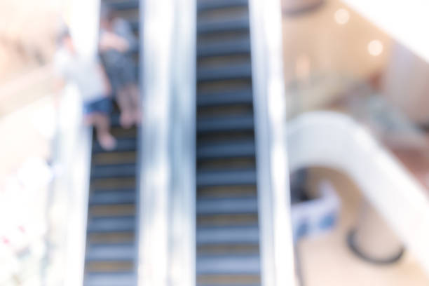 istock Abstract background of people on shopping mall 1014520118
