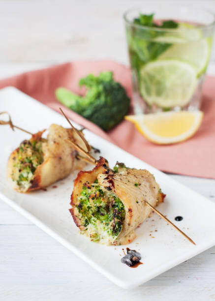 istock White fish roulades stuffed with broccoli and asparagus 1014522188