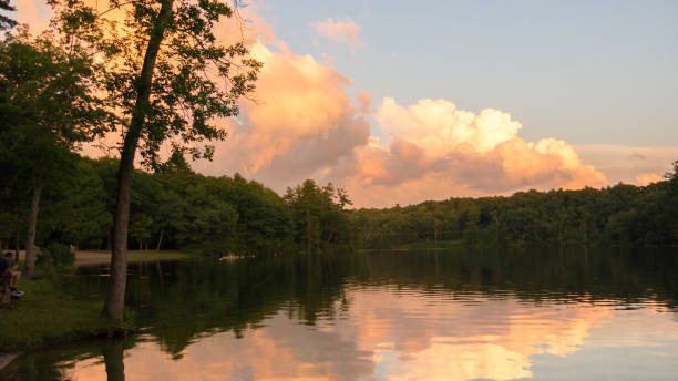 istock Trees framing Adirondack Mountains Haviland Cove Sunset Hudson River, Glens Falls, NY 1014549650