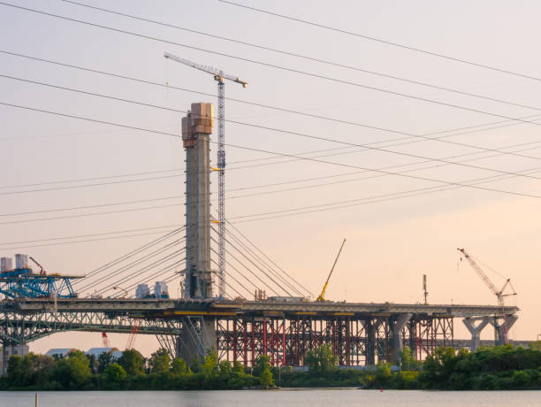 istock Major bridge construction site at the golden hour, Montreal, quebec, Canada 1014557746
