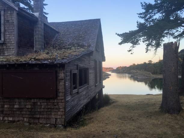 istock Old cabin overlooking the bay 1014565790