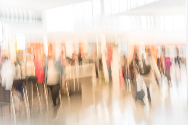 istock Abstract blurred customer sitting and queuing at airport coffee shop 1014573482