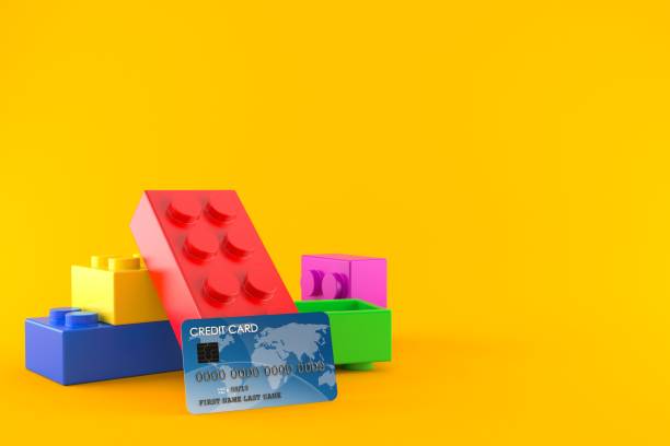 istock Toy block with credit card 1014576250