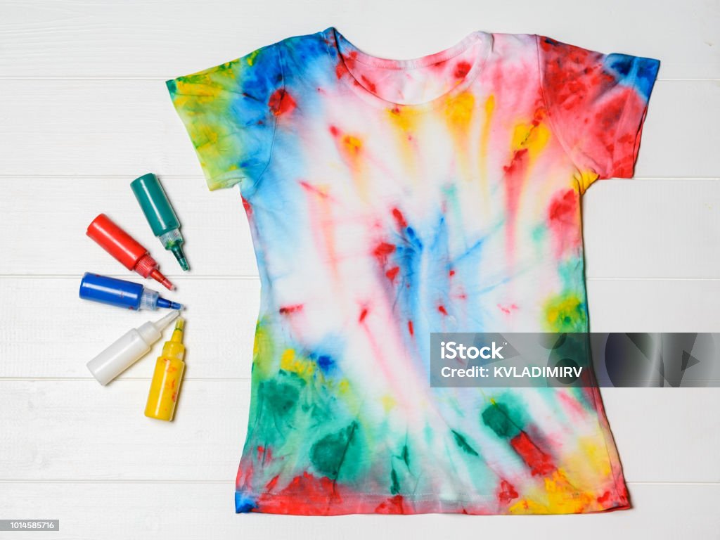Tubes Of Paint For Clothes And Tshirt In Tie Dye Style On A White Table  Flat Lay Stock Photo - Download Image Now - iStock