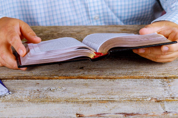 istock A man reading the Holy Bible close up hands 1014587830