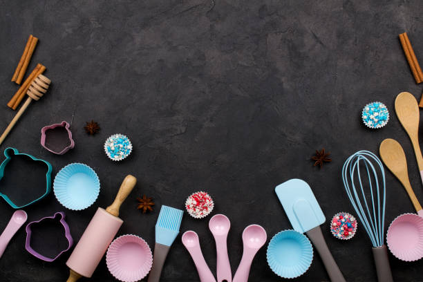 istock Various kitchen baking utensils. Flat lay. Top view, mockup for recipe on dark background. 1014613506