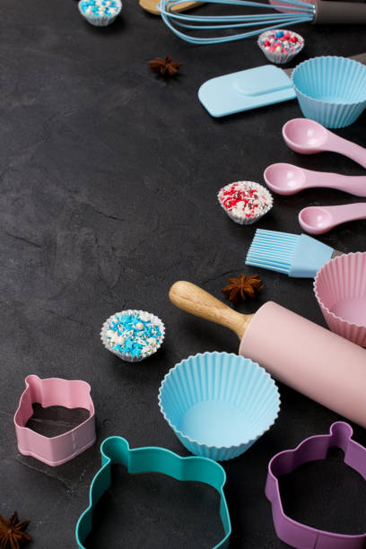 istock It's cooking time. Baking tools on dark. Recipe book background concept. 1014613510