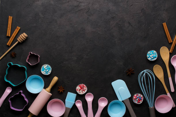 istock Baking and cooking utensils. Flat lay Top view, mockup for recipe on dark background. 1014613564