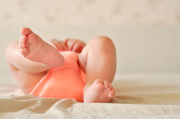istock Baby boy cute feet diaper 1014613806