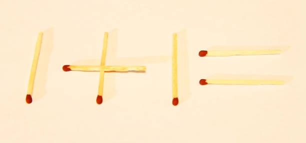 istock Equation writing by matches isolated on the white background 1014619102