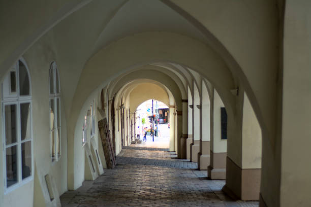 Arched passage in the old European city by day