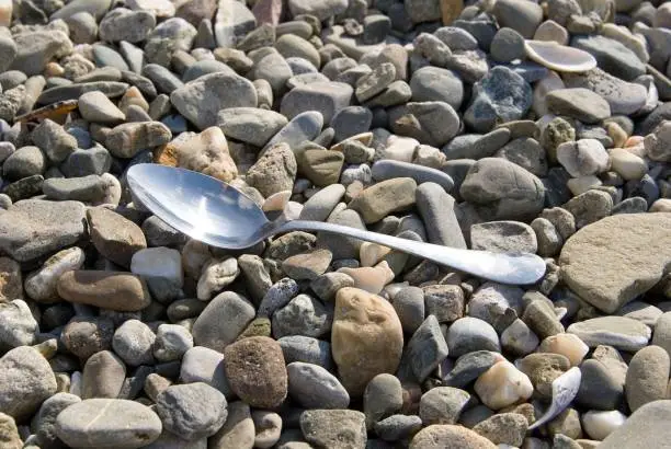spoon on a background marine stone