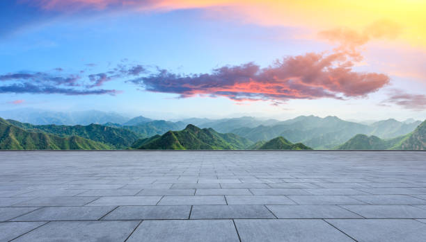 istock Square floor and mountain natural landscape at sunrise 1014646232