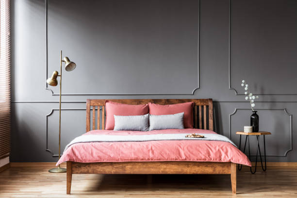istock Pink and grey bedroom interior 1014648506