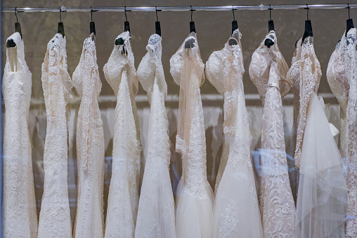 wedding dresses on a hanger