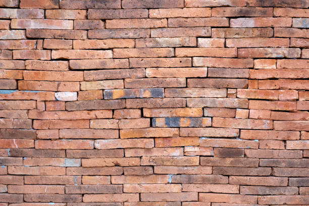 istock Grunge orange brick wall texture background,outdoor wall. 1014648974