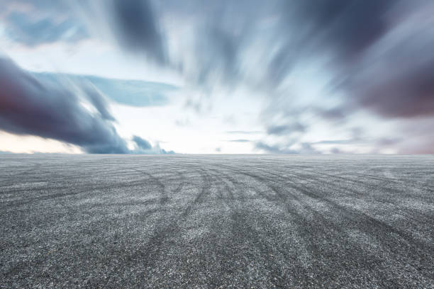 istock Car drift asphalt square scene at dusk 1014651676