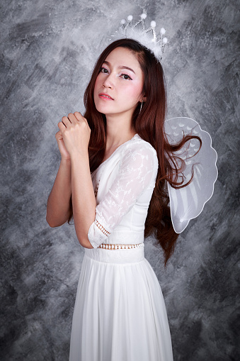 portrait of a beautiful young woman angel