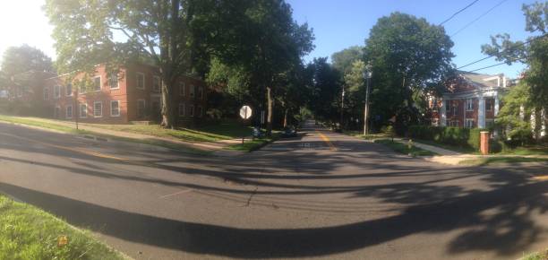 istock Panoramic suburban street crossroads 1014652342