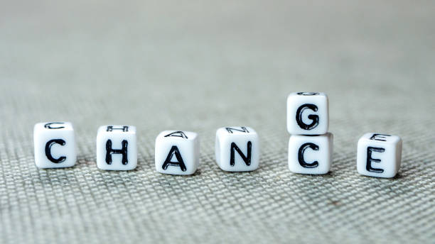 istock Changing white cubes with word 