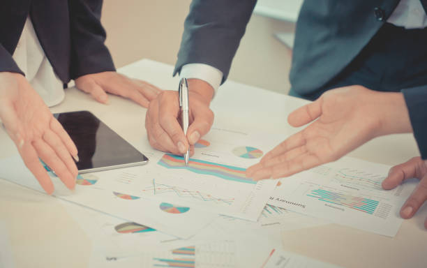 istock Business Data Chart and report on meeting table 1014658046
