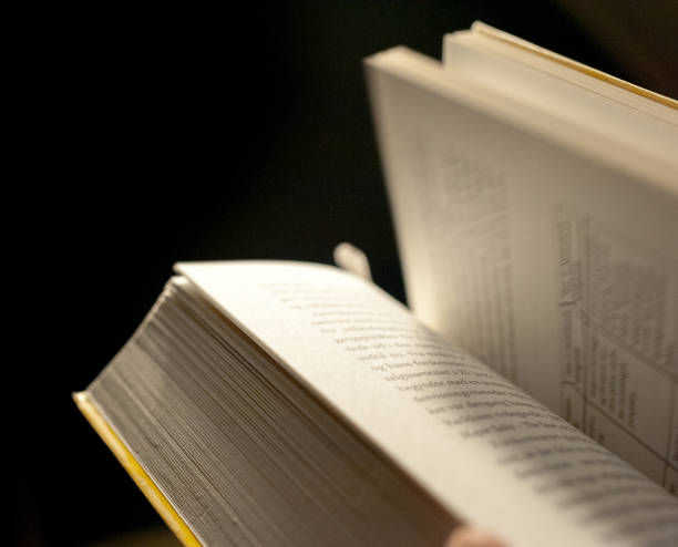 istock Flipping Through Pages Of Book With Motion Blur 1014664646