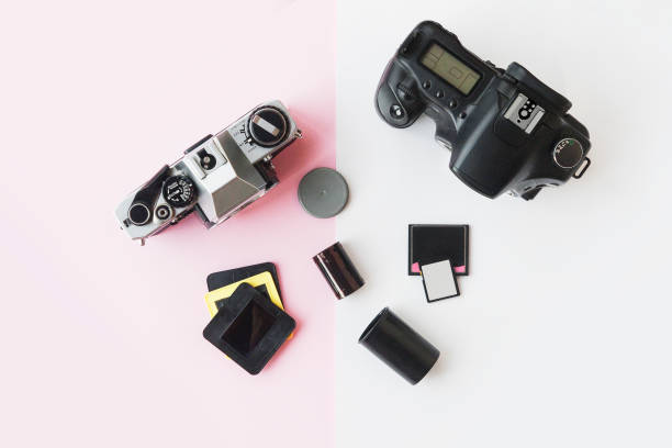 istock Digital vs. Analog SLR Camera with Slides, Memory Cards, 35 mm Film 1014668456