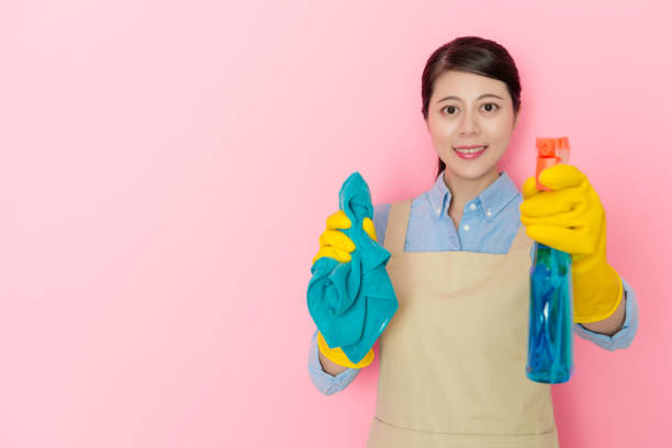 istock beautiful woman housekeeper looking at camera 1014676132