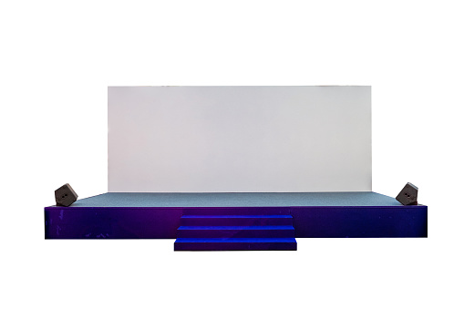 Blue stage with stairs on board white backdrop