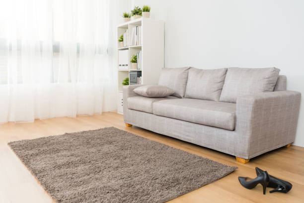 istock comfortable living room with high heel shoes 1014690682