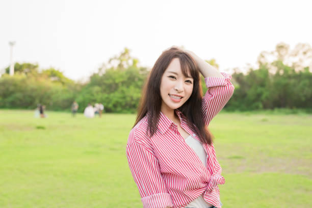 istock woman smile happily 1014690712
