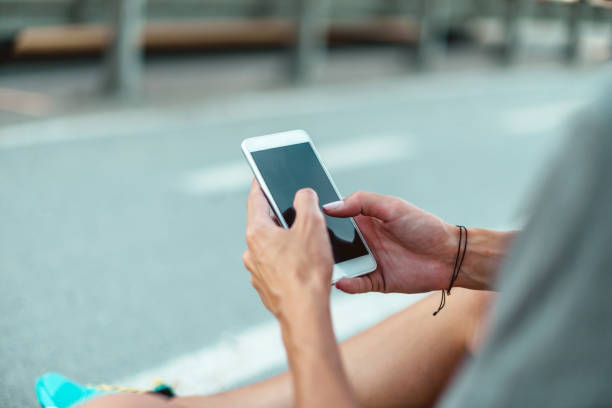 istock Woman with mobile phone, sport and workout 1014694394