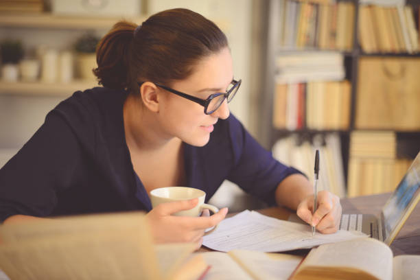 istock young woman working at home 1014694514