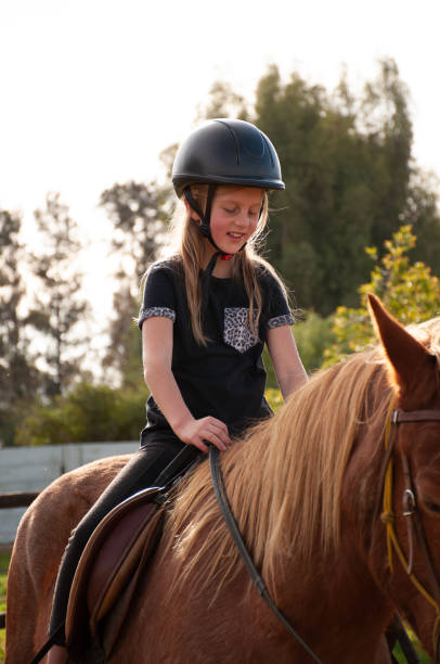istock girl on horse back 1014694658