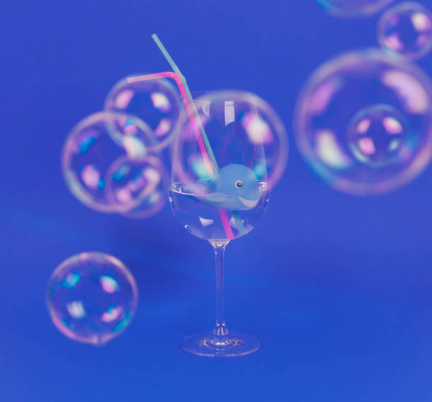 istock Whale in glass with water and plastic straws. Plastic pollution affecting marine ecology. Environmental concept. 1014697370