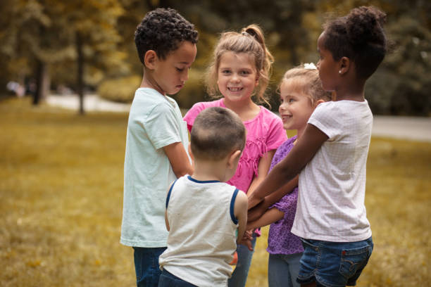 istock Group of children share happiness . School kids. 1014702804