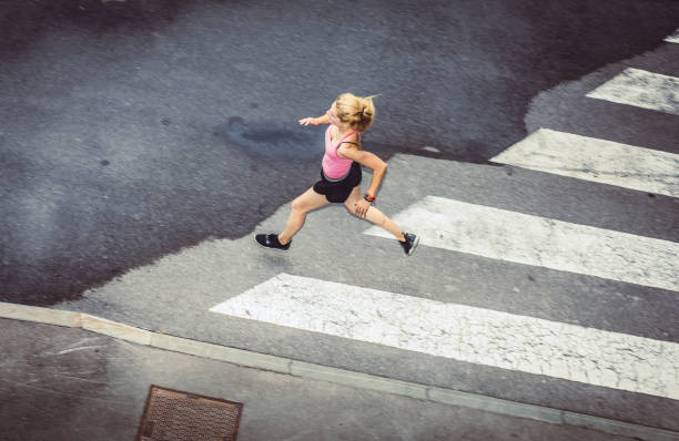 istock Female Athlete Runnin in Urban Environment 1014712070
