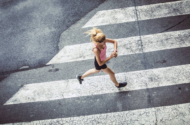 istock Female Athlete Runnin in Urban Environment 1014712802