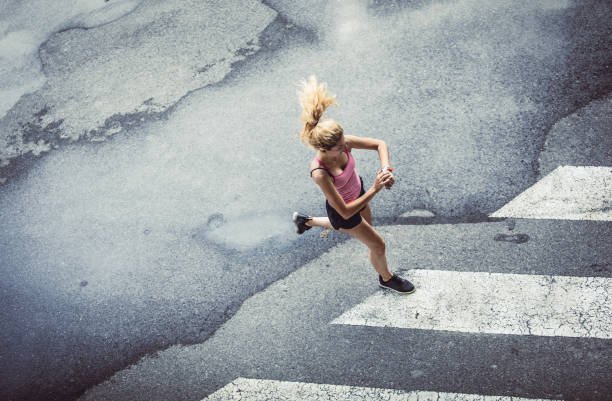 istock Female Athlete Runnin in Urban Environment 1014712812