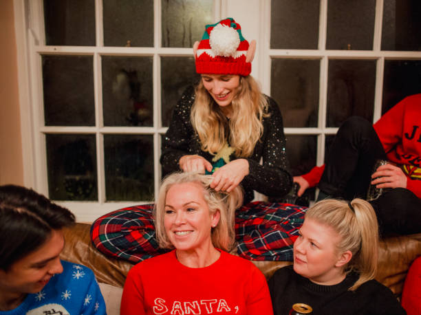 istock Plaiting Hair at Christmas House Party 1014724466