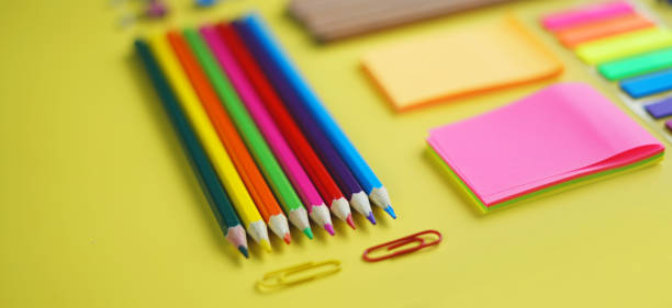 istock Tidy School Stationary on Yellow Background 1014730220