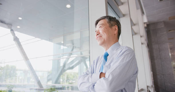 istock old businessman look somewhere 1014732982
