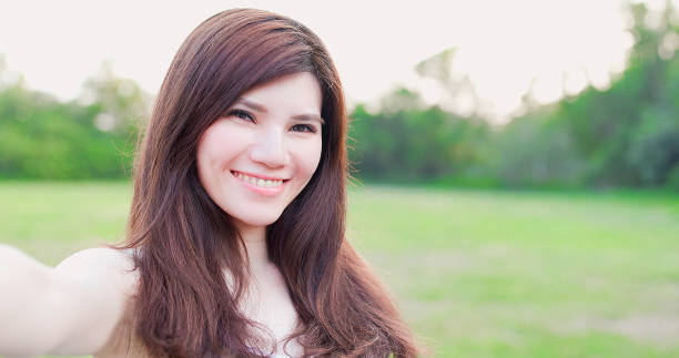 istock woman selfie happily 1014733638