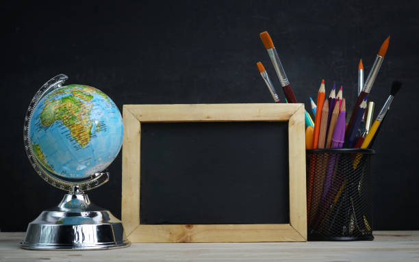 istock World Globe, School Stationary and Alarm Clock. Blank Space 1014734052